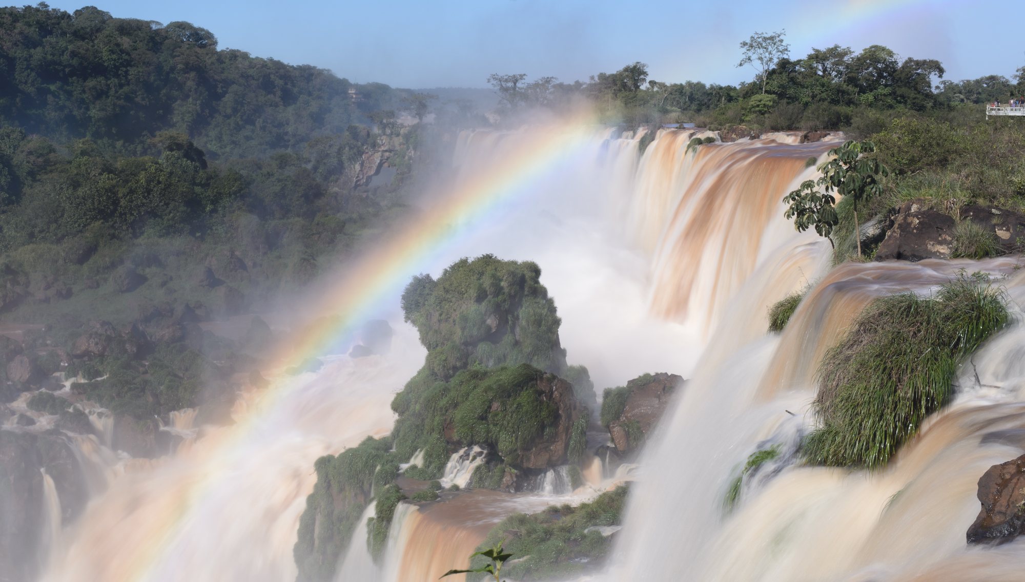 Iguazu Falls with a rainbow in the mist
